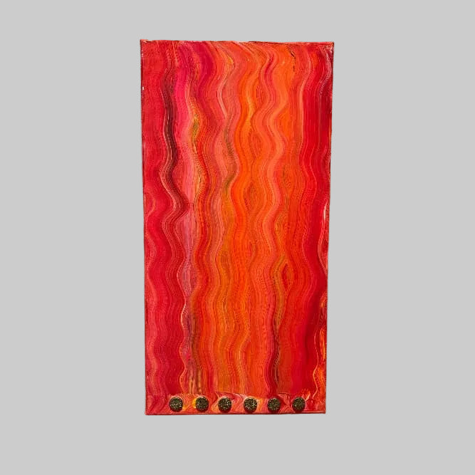 Rectangular red and orange wavy patterned object on a gray background
