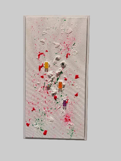 Abstract art piece with splashes of red, white, and multicolor on a beige background